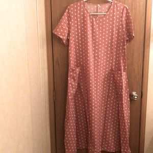 I ordered this beautiful casual dress online. I wear 16-18. It probably is 12-14